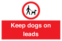 dogs-on-lead-symbol-with-black-text-on-white-background~